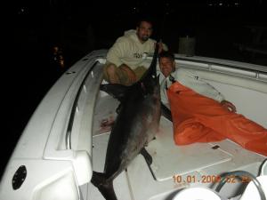 Nick Doup and Kenny pose with the Sword